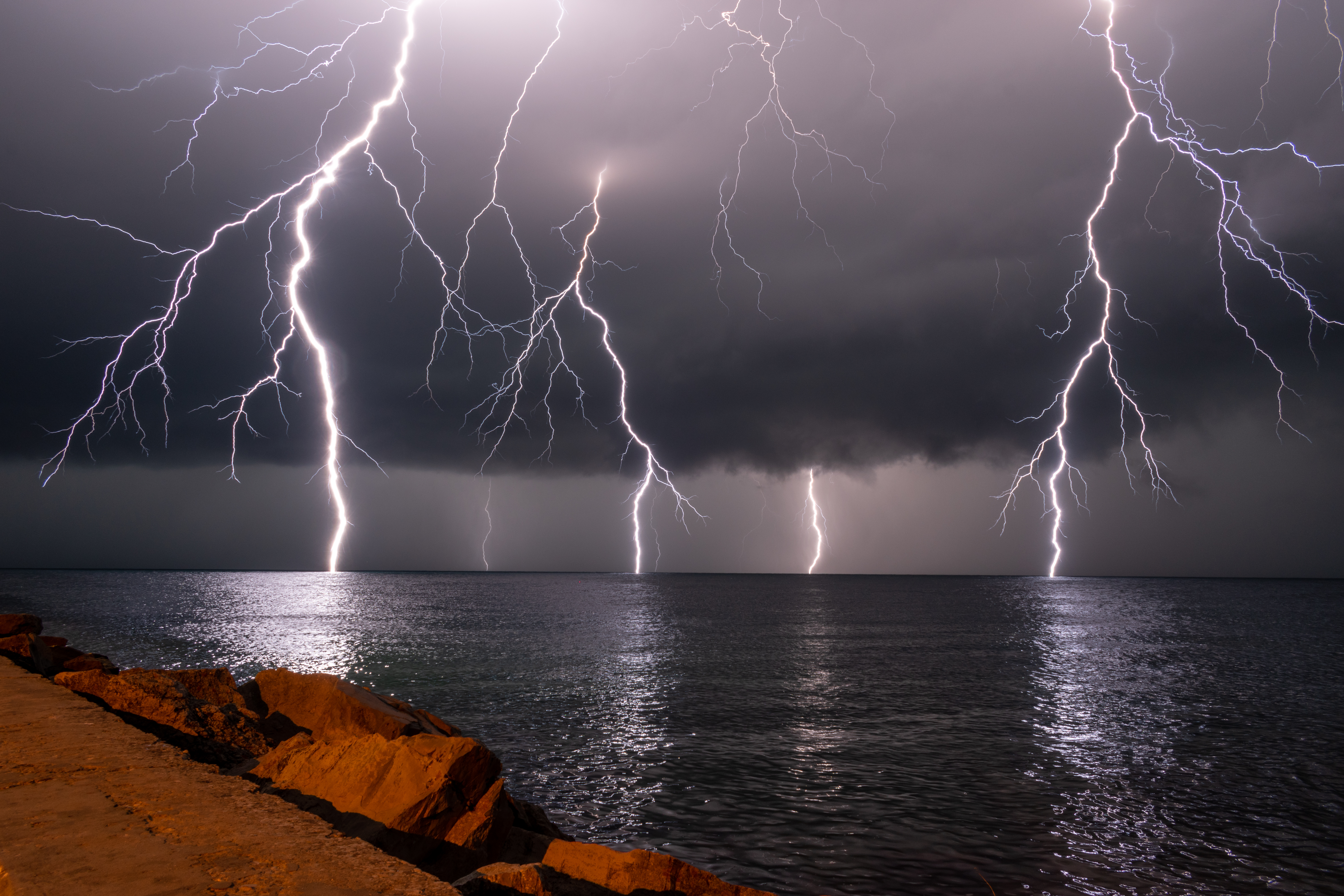 Lightning strike over water